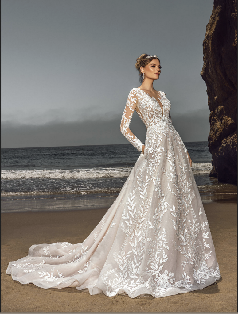 Long-sleeve lace is a good fabric for a winter wedding dress
